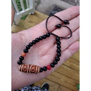 Glass Bead Bracelet with Barrel Charm Slide Knot Closure Black Red Brown